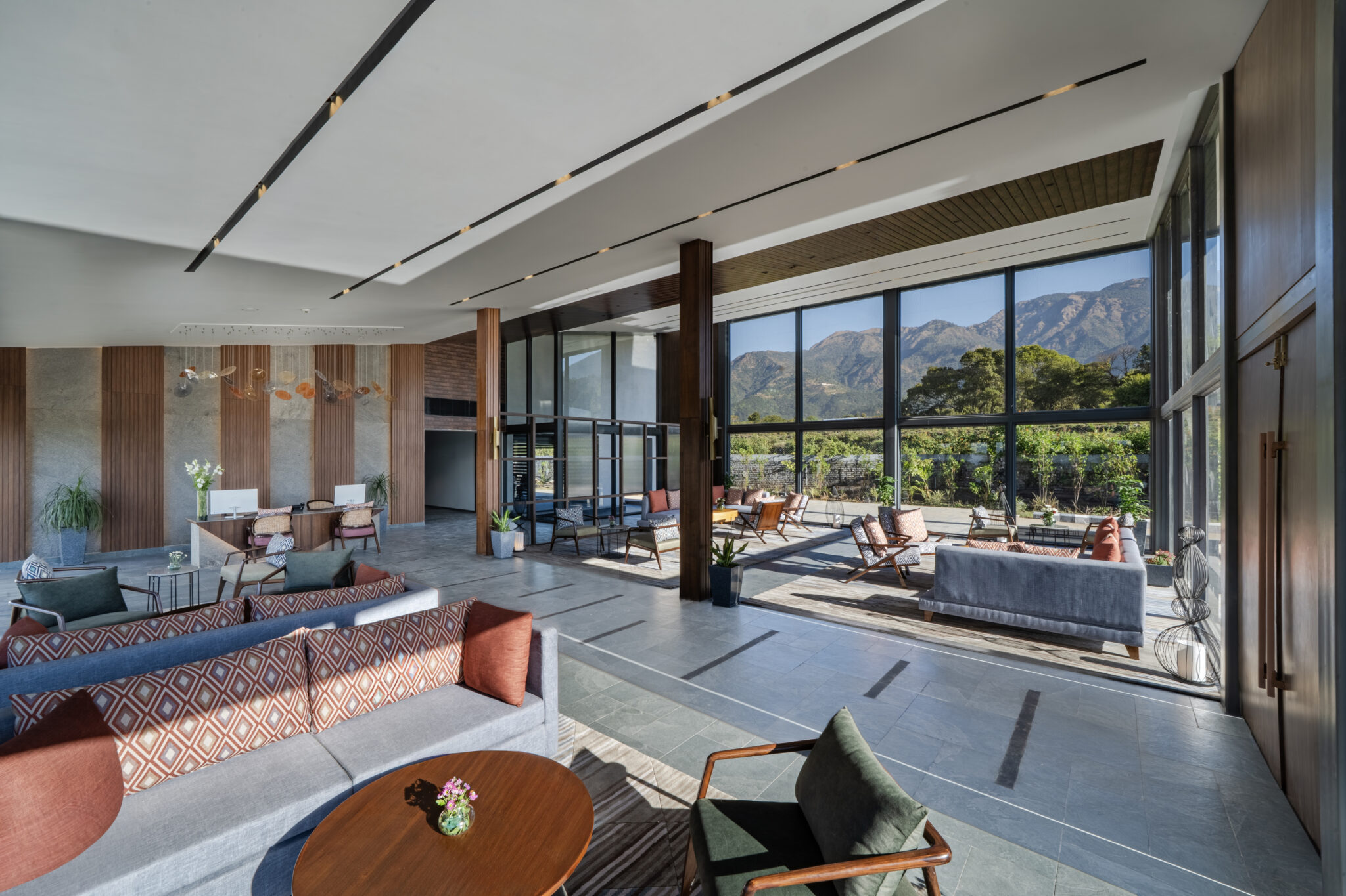 Spacious lobby with comfortable furniture at Vandhara Sarovar Premier Patkote